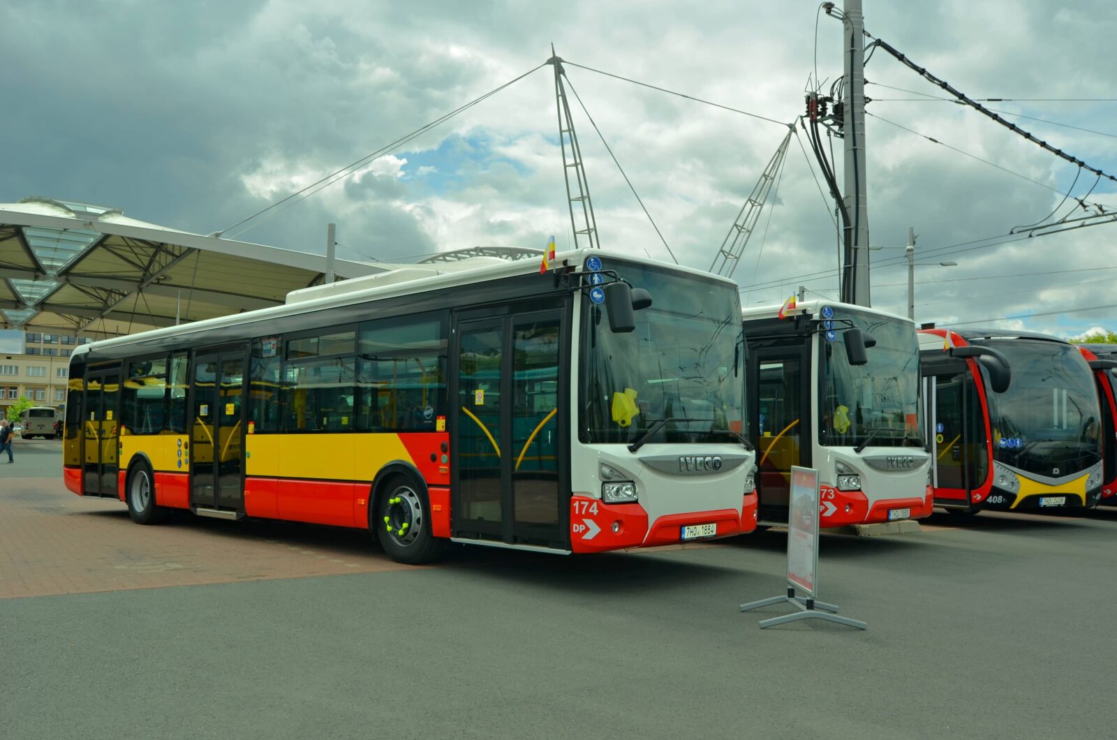 View of parked IVECO URBANWAY buses behind the public transport terminal