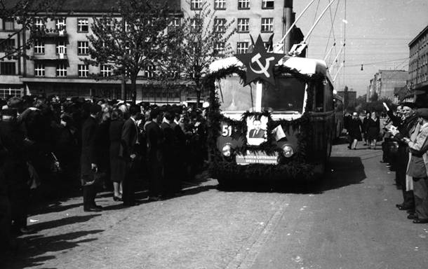 Decorated historical trolleybus with a photo of then president Gottwald