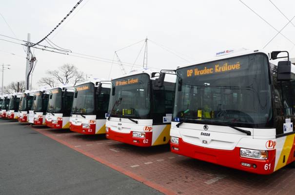A row of parked HK public transport trolleybuses in the car park