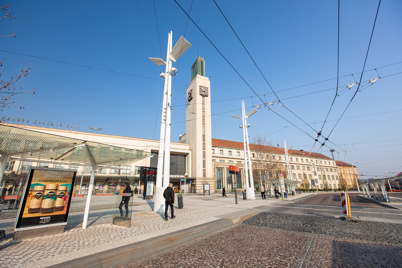 Front view of the public transport stops in front of the main railway station in 2022