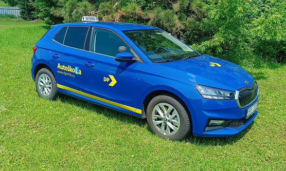 Driving school vehicle - blue Fabia on the lawn at the driving school
