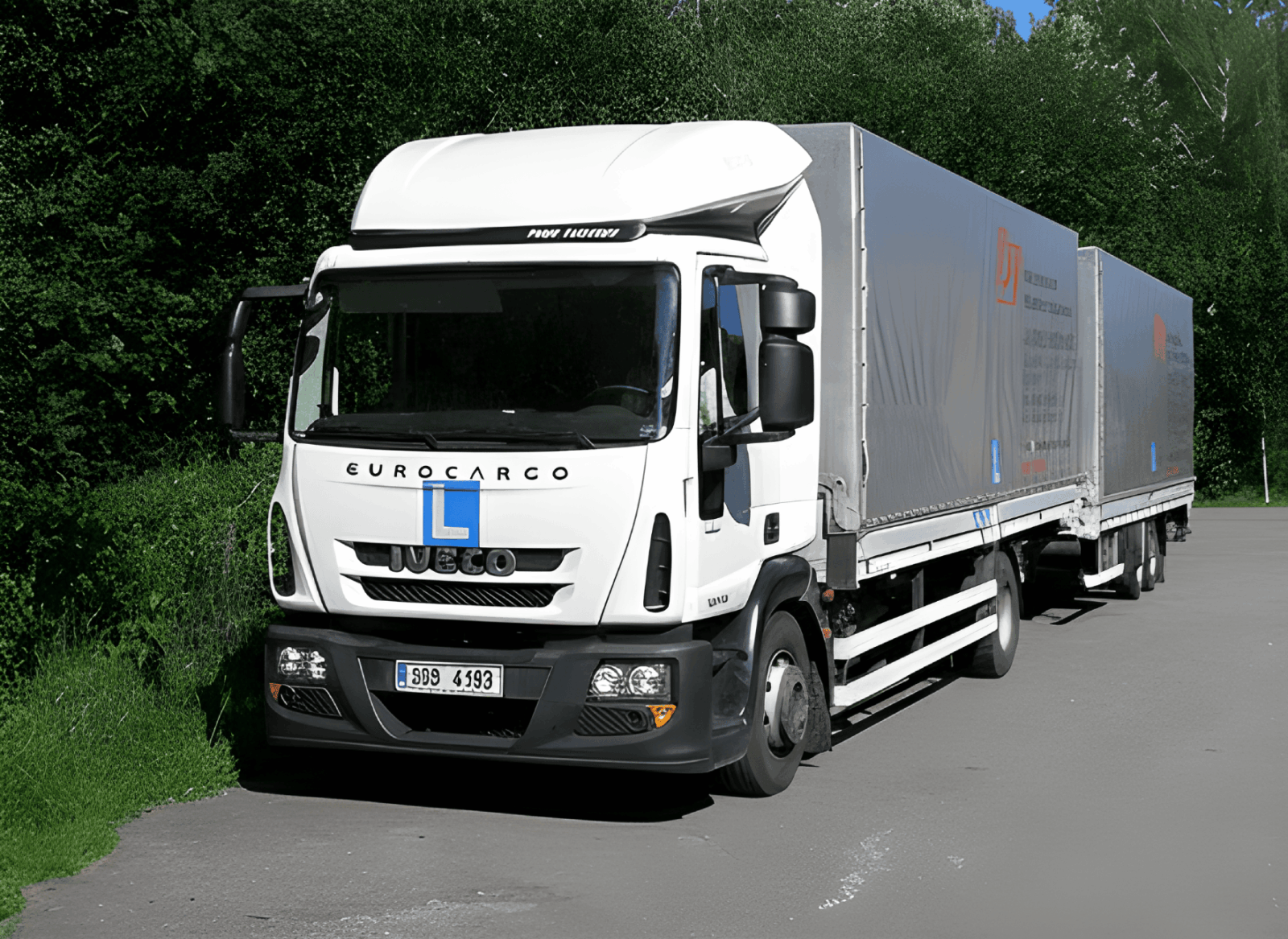 Driving school vehicle - Iveco truck with trailer in the parking lot