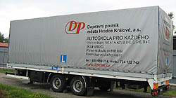 A parked truck trailer of a driving school