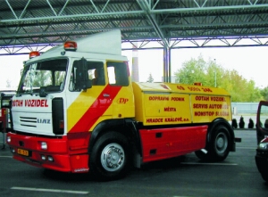 Vehicle for towing vehicles and buses in the parking lot of the public transport area