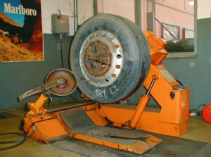 Machine in the tyre shop for taking off and putting on tyres