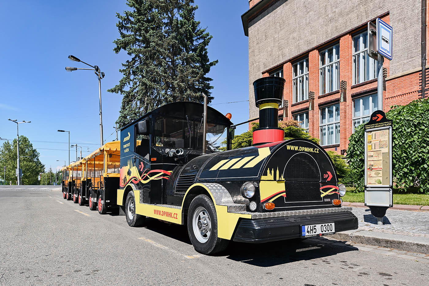 The tourist train of the transport company parked in front of the East Bohemian Museum
